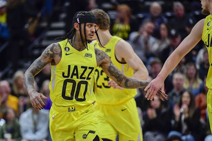 Utah Jazz forward/center Kelly Olynyk (41) congratulates guard Jordan Clarkson (00) after a basket against the Atlanta Hawks during the first half at Vivint Arena.